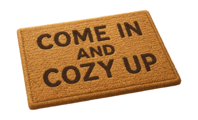 A funny doormat crafted from soft textiles, ideal for a cozy home's entrance.