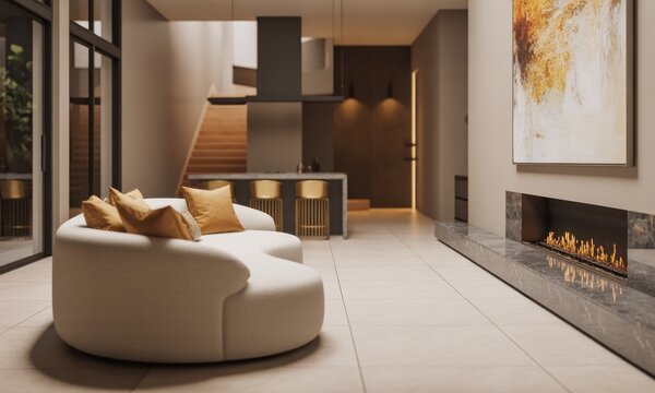 Modern interior living space with sectional sofa, fireplace, kitchen, staircase, & artwork