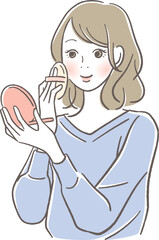 化粧をする笑顔の女性