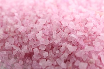 Pink sea salt as background, closeup view