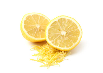 Lemon zest and halves of fresh fruit isolated on white