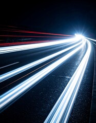 Long exposure of car lights on a dark highway