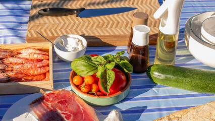 Sunlit Mediterranean feast with vibrant prawns, fresh basil, and zucchini, perfect for Ferragosto celebrations or Solstice picnics