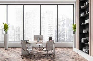 Contemporary office interior with minimalist desks, ergonomic chairs, and bookshelf, set against tall windows showing cityscape. 3D Rendering
