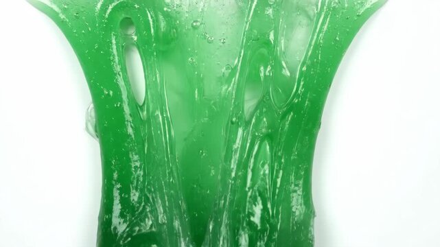 Green Slime On White Background Close-Up View During Daytime Studio Session