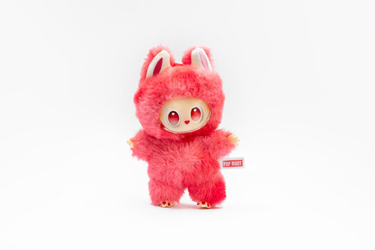 Labubu toy pop mart on white.