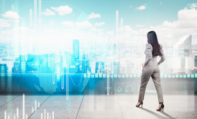 Woman in business attire stands on rooftop viewing digital data graphics overlaying city skyline, representing futuristic analytics and creative concept