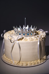 Celebration cake with crown and candles for a special occasion