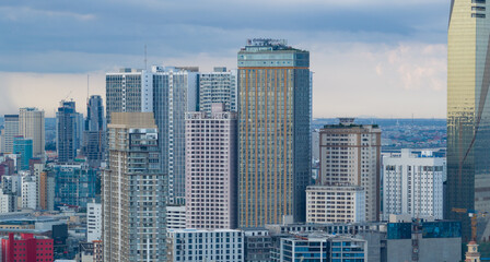 Fototapeta premium Top view aerial of Phnom Penh capital with development buildings, transportation, energy power infrastructure. Famous tourist city of Vietnam, sharing the border with ThaiLand