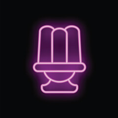 Vivid neon sign depicting a pudding dessert, glowing brightly against a dark background