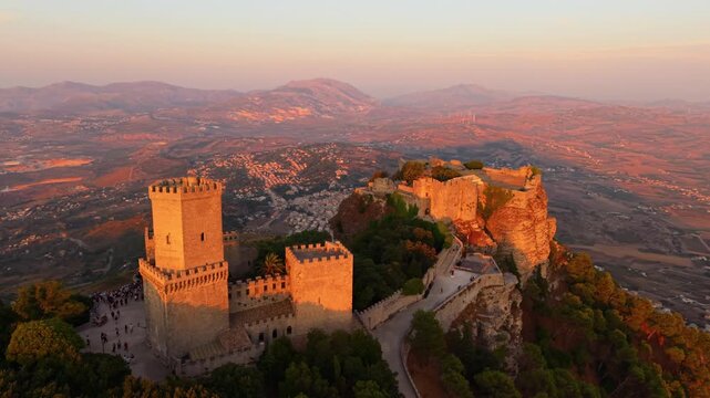 Historic Castles Of Balio And Venus On Top Of Mount Erice At Sunset In Sicily, Italy. - aerial shot