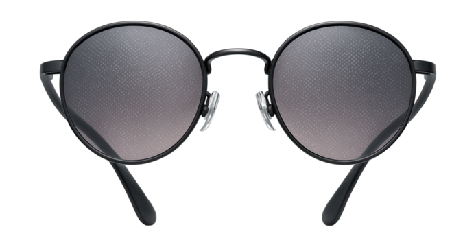 Rounded pinhole glasses with flexible TR-90 arms and adjustable nose pads.