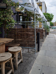 London - 06 24 2022: Pub terrace on Hillgate St