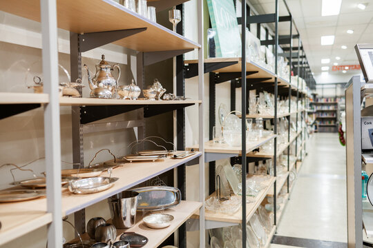 Shelves of second hand goods at an op shop