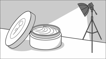 Studio shot of cream jar under a light.