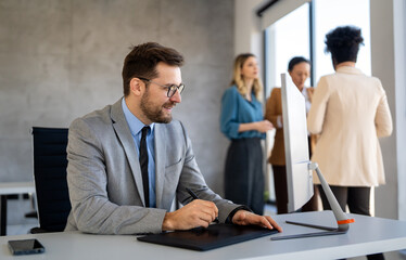 Banker in a finance office manages portfolios, credit, risk and financial strategy with expertise