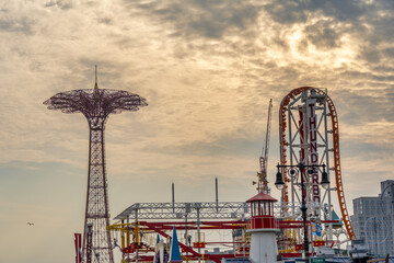 Wide view of Coney Island with Wonder Wheel, roller coasters, and other attractions