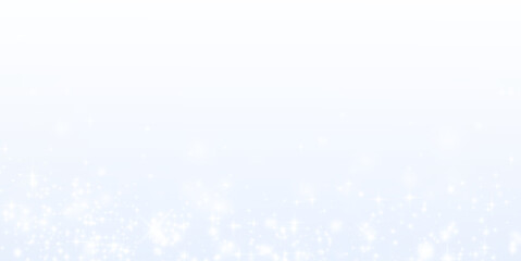 A multitude of white stars is gracefully falling on a blue background