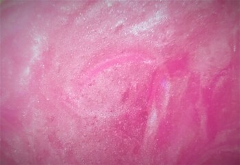 Fototapeta premium Close up of slime gome pink abstract background for patern design and others cretive projects. Purple slime texture macro shot texture with bubbles and glossy surface. abstract background.