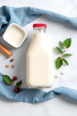 Organic Plant-Based Milk Bottle and Creamy Almond Beverage in Rustic Kitchen: Fresh Dairy Ingredients and Healthy Nutrition with Cinnamon, Nuts, and Flowers Decor 