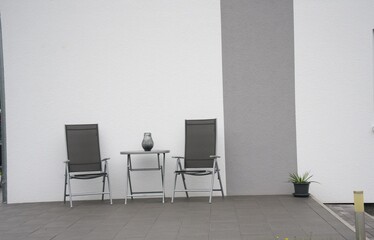 Modern patio furniture creating an minimalist outdoor living space