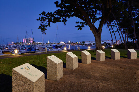 War memorial  with marina behind at night