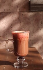 Hot Chocolate on Table in Autumn Sunlight