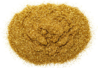 Isolated pile of golden glitter powder dust or pigment for glamorous makeup and crafts use