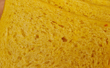 Pumpkin bread on a wooden plate