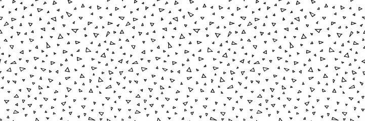 Vector hand drawn seamless pattern with tiny small triangles. Artistic digital paper. Endless texture backdrop. Tileable background illustration in black and white colors