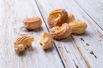 Typical brazilian sugar covered biscuit over wooden table
