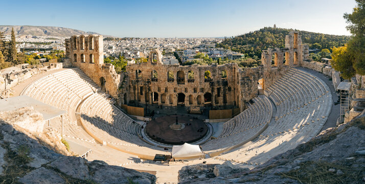Fototapeta Ancient Odeon of Herodes Atticus amphitheater on the slopes of the Acropolis in Athens, Greece. A powerful contrast between ancient history and the vibrant capital of Greece.