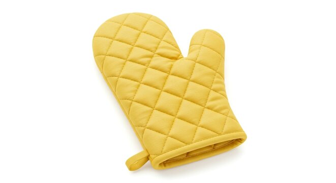 A yellow oven mitt with a quilted pattern lies on a white surface slightly angled to the left