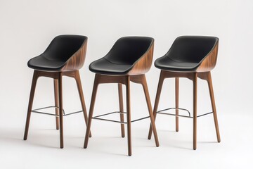 Three modern plywood and leather bar stools
