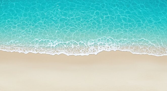 Aerial view of pristine white sand beach meeting crystal clear turquoise ocean water with gentle waves creating foam