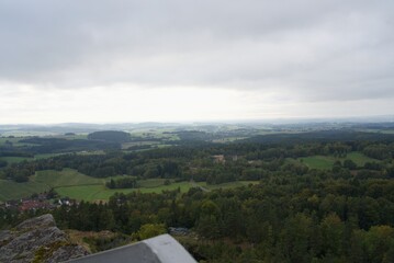 Ancient castle ruins overlooking picturesque village in bavarian forest