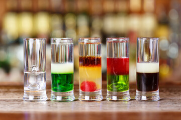 Many colorful cocktails on the bar