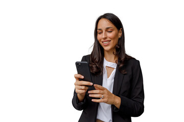 Happy young businesswoman using a mobile phone, texting, or scrolling on a smartphone with a...