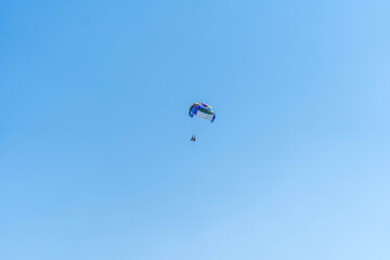 Parasailing Adventure High in the Clear Blue Sky