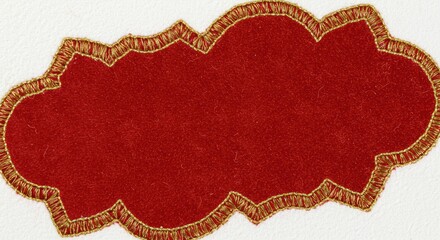 Red decorative element with textured surface and golden trim on white background