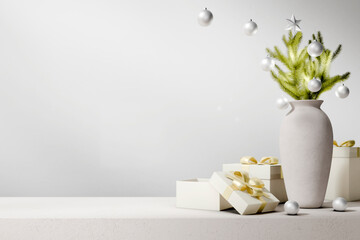 Christmas presents and fir tree branch on empty table. New year and winter holiday background. Minimal interior countertop mockup scene for xmas gift display.