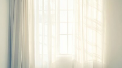Soft sunlight filters through sheer curtains creating a serene atmosphere in a bright room
