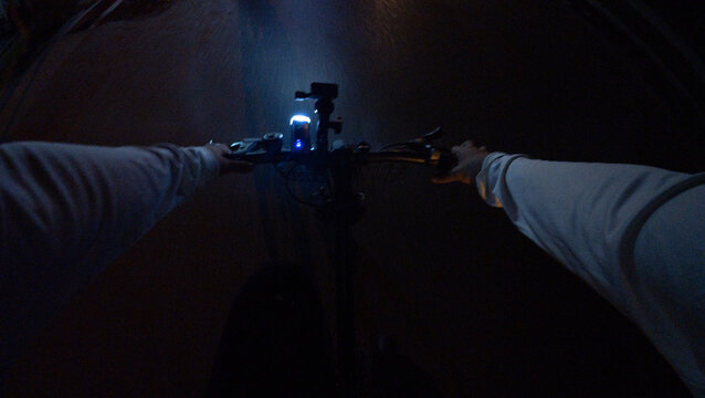 First-Person View of Setting Up Camera at Night