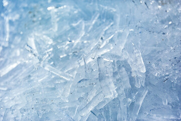 Ice sticks. Winter texture. Melting snow natural background