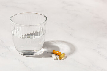 Pills and glass of water