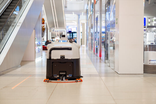  Industrial automatic robot cleaner mopping the floor in the Mall, Robot cleaner on duty