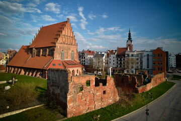 Historic Teutonic castle ruins in Elblag Old Town aerial view with Gothic architecture brick buildings and medieval fortifications urban landscape
