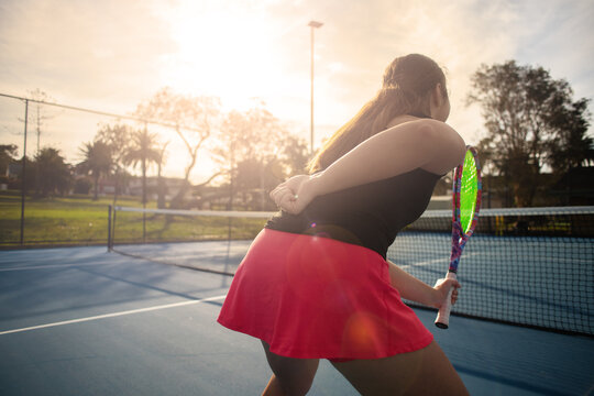 woman making hand signals in a tennis match