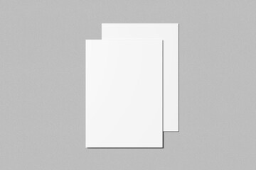 Blank paper sheets for brochure on grey background.  A4 size portrait mock up. 3D illustration. 