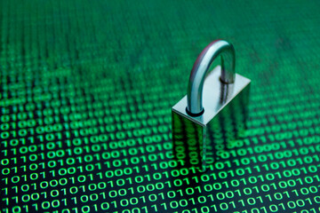 Cybersecurity concept with a padlock over binary code background, symbolizing data protection, encryption, and internet security in the digital world.
